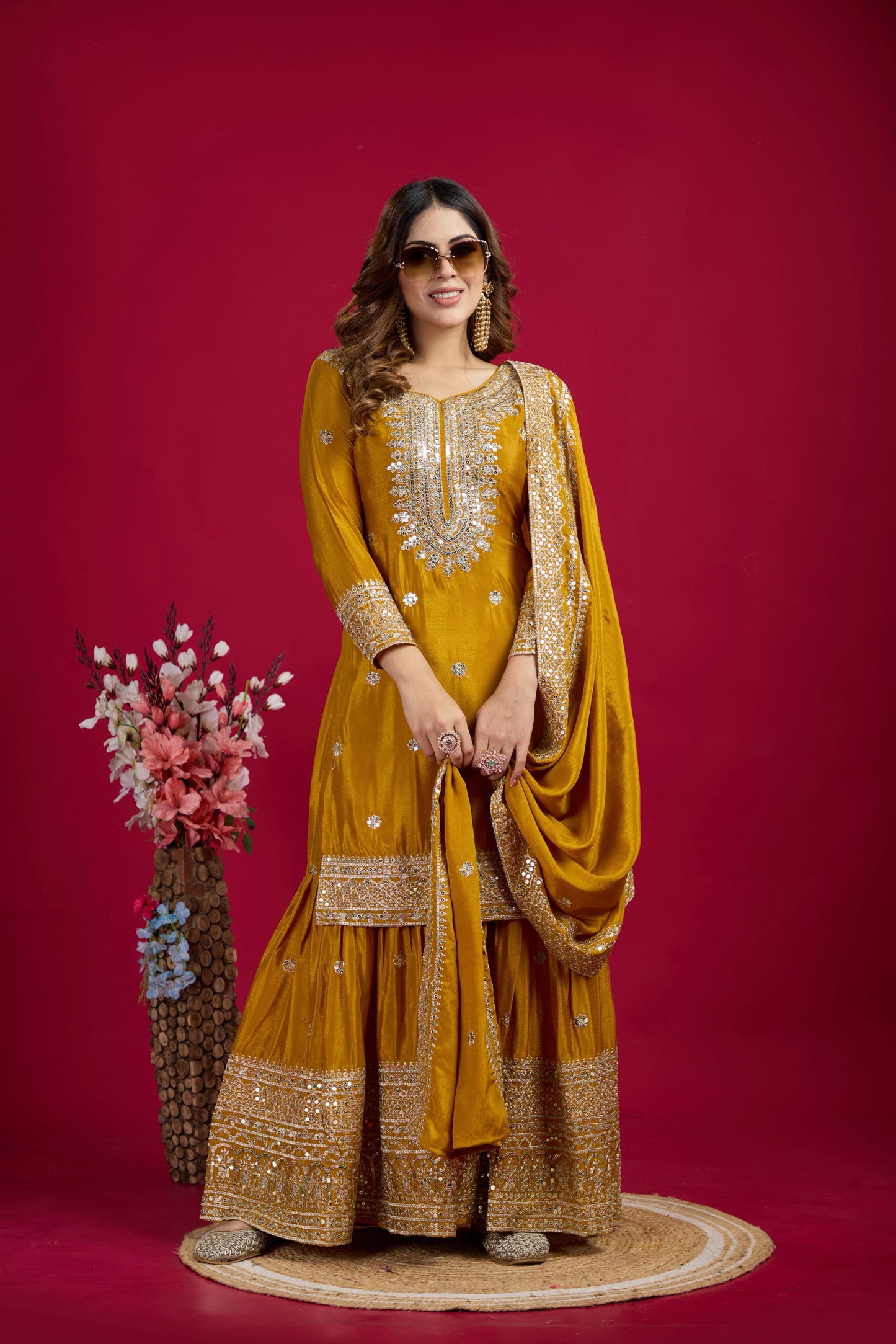 Luxurious Chinnon Silk sharara set with heavy embroidery & sequence work.
