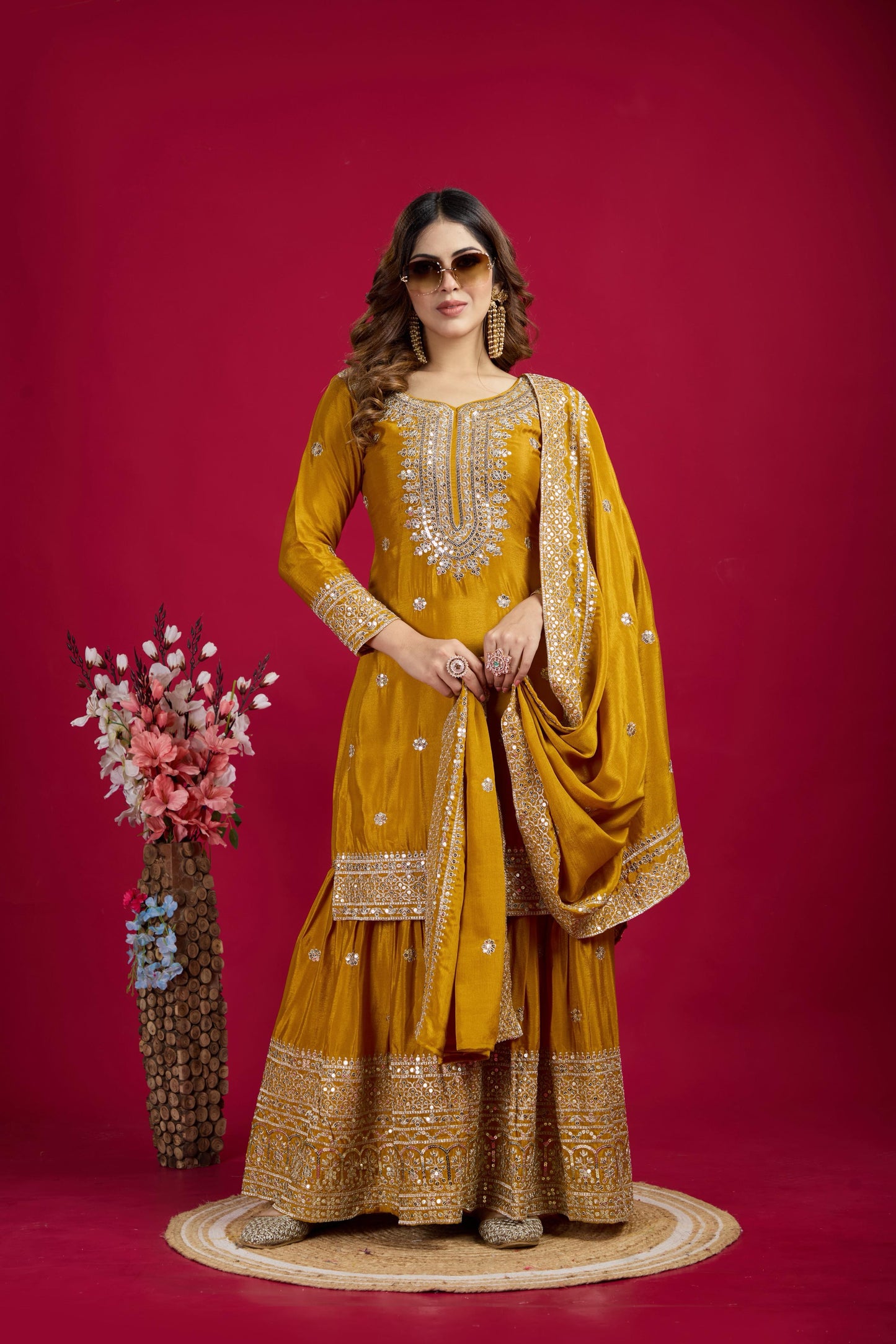 Luxurious Chinnon Silk sharara set with heavy embroidery & sequence work.