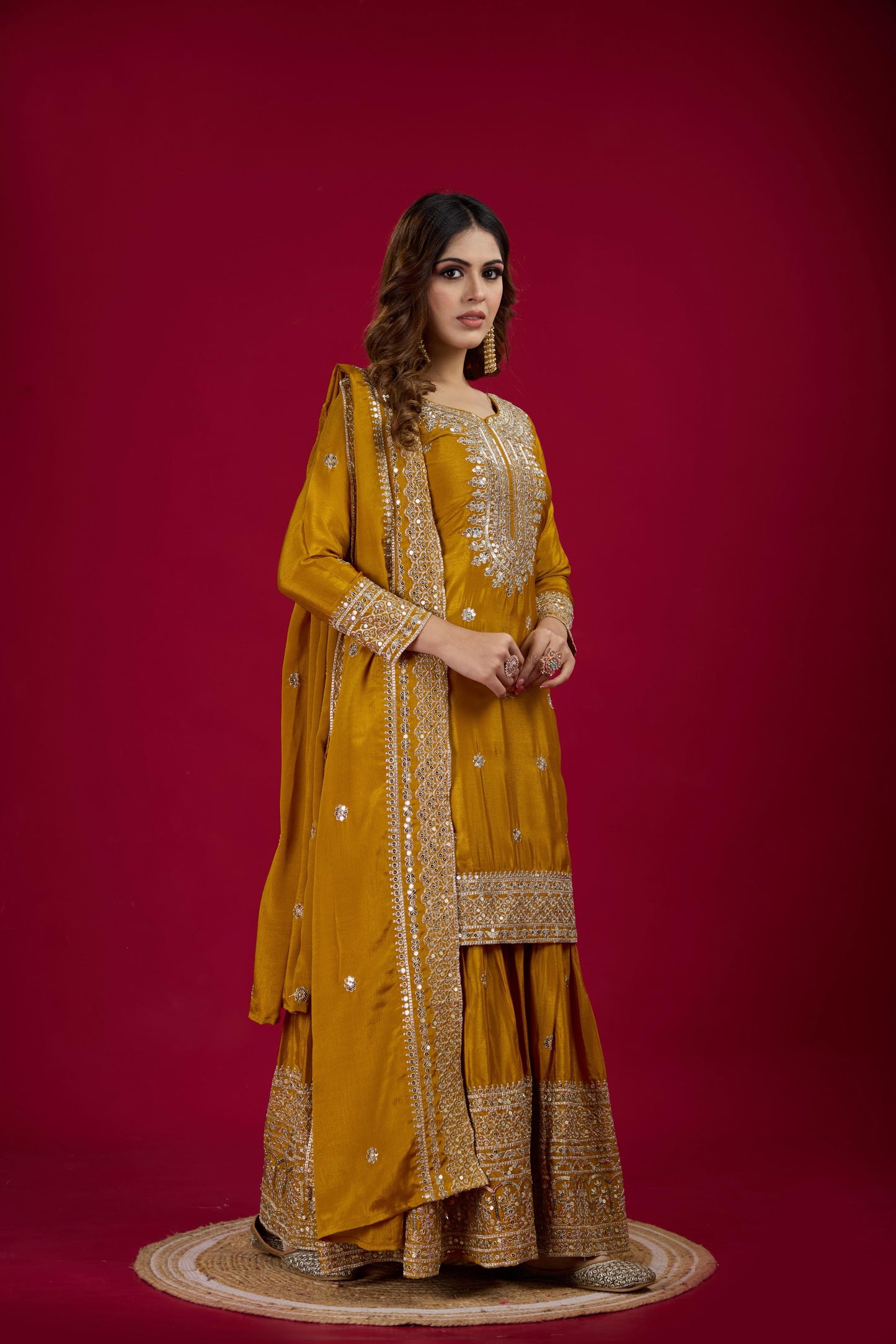 Luxurious Chinnon Silk sharara set with heavy embroidery & sequence work.