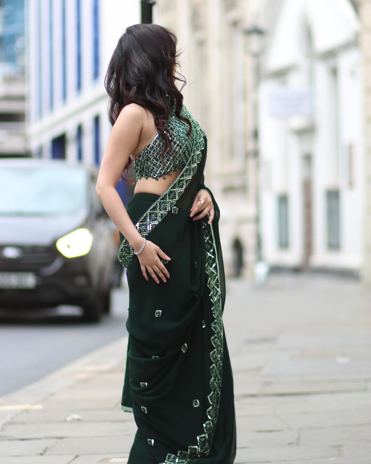 Designer Saree with Heavy Embellished Halter Blouse