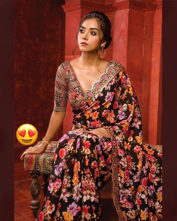 Elegant Black Floral Saree with Embroidered Blouse Design