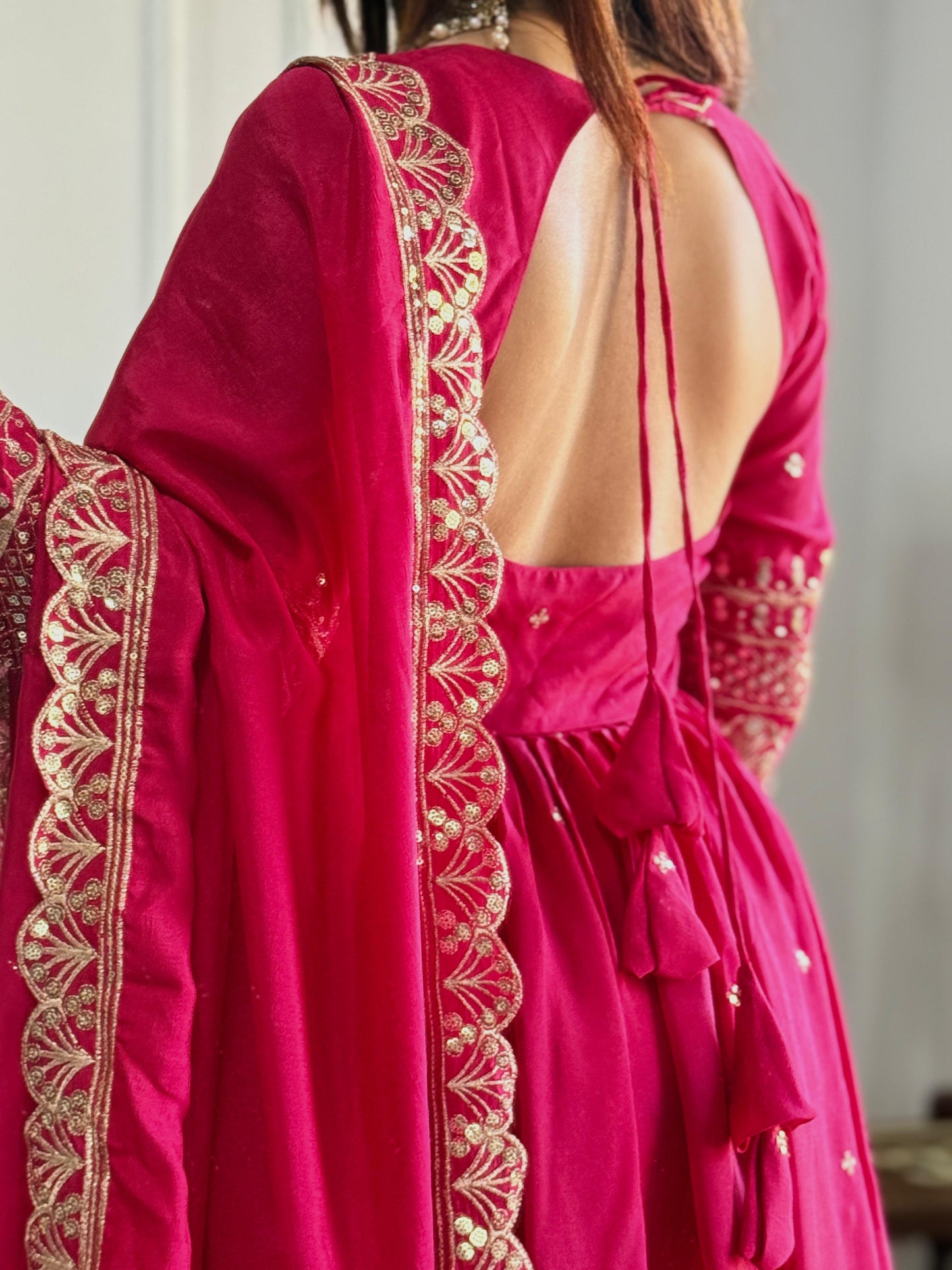 Graceful Pink Anarkali Suit with Golden Embroidery Work