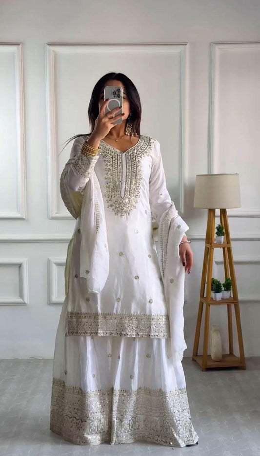 Luxurious Chinnon Silk sharara set with heavy embroidery & sequence work. 