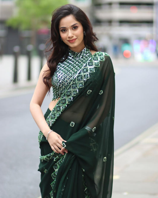 Designer Saree with Heavy Embellished Halter Blouse