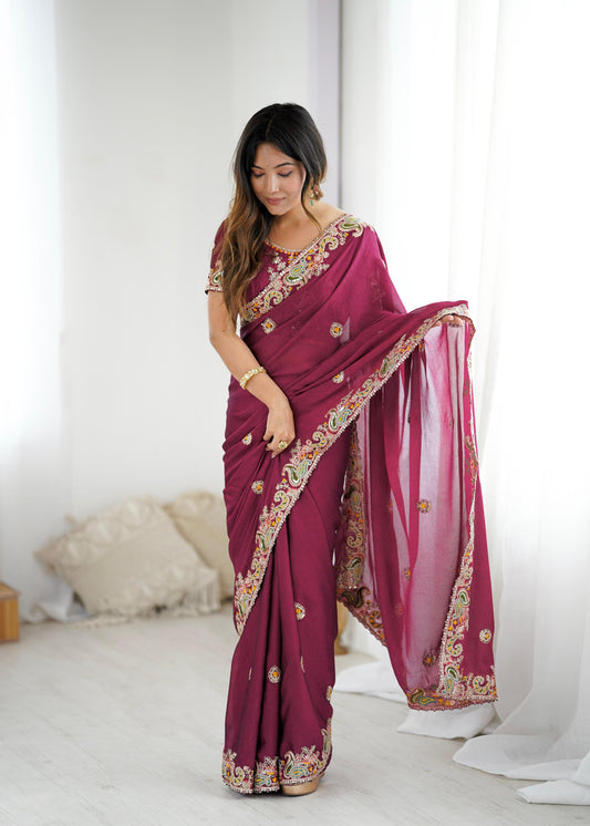 Elegant Embroidered Saree with Paisley Border and Matching Blouse