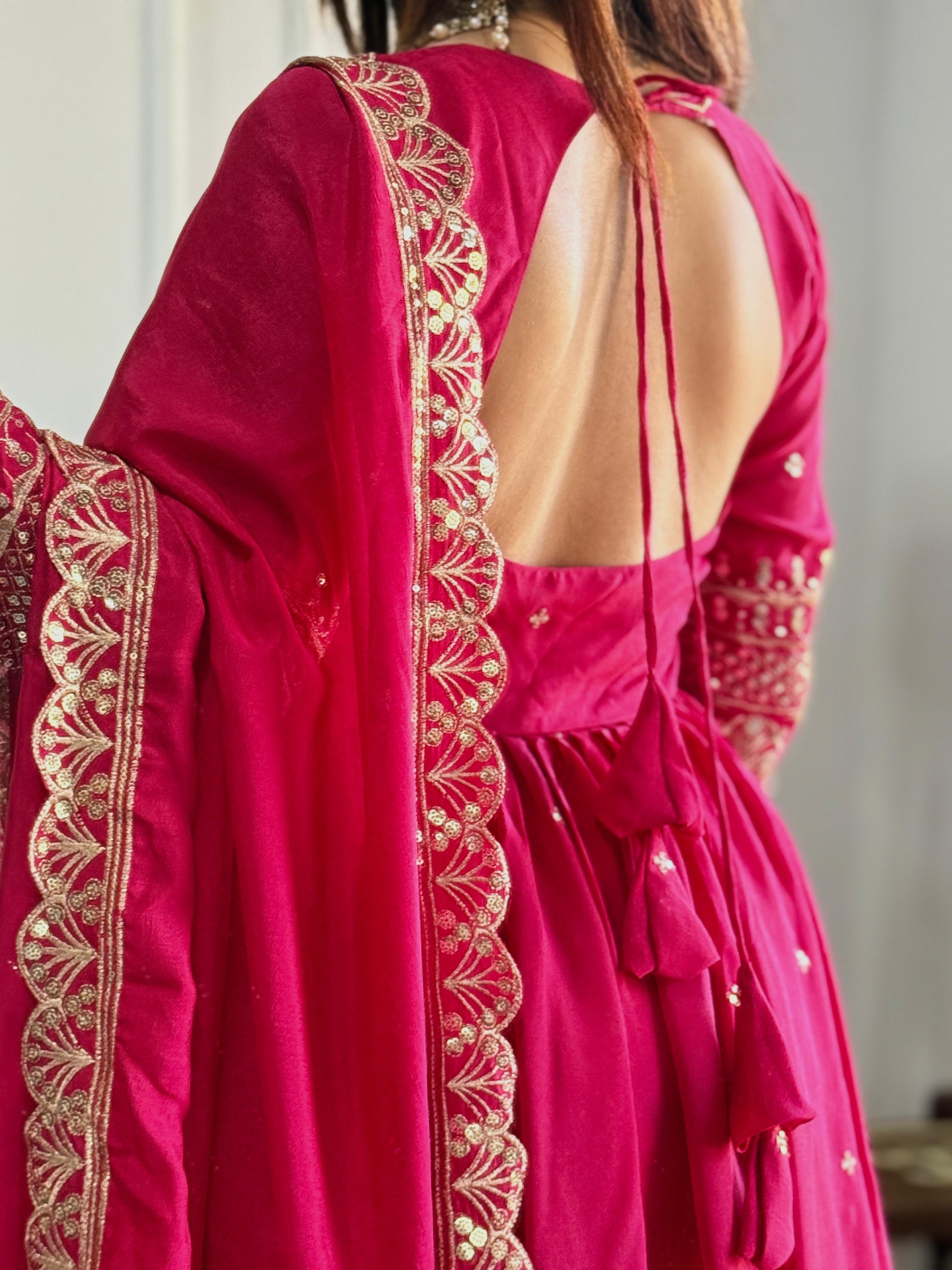 Graceful Pink Anarkali Suit with Golden Embroidery Work