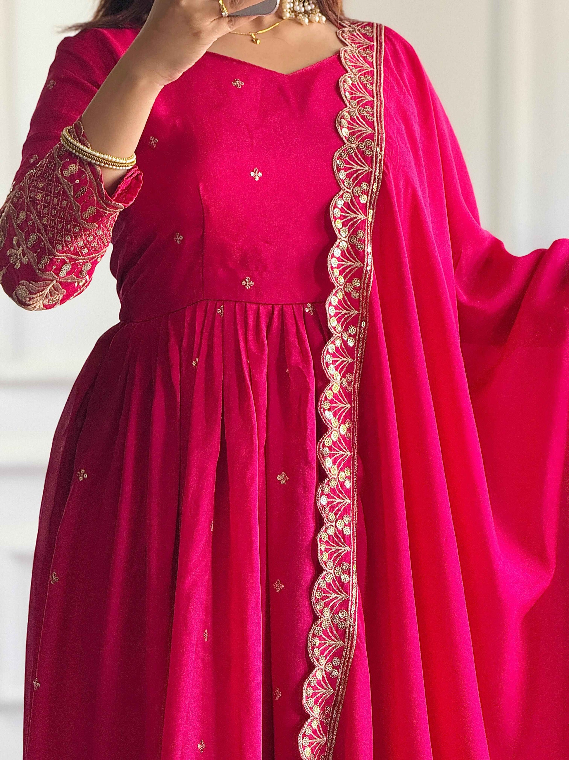 Graceful Pink Anarkali Suit with Golden Embroidery Work